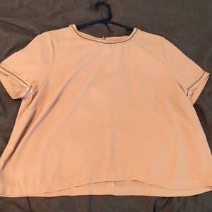 Blush pink polyester top. Could work as a medium/large looser fitting top.